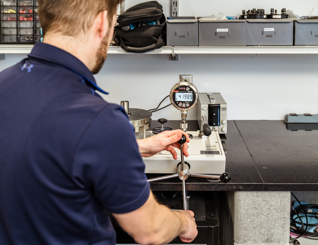 Image of an Instrumart employee working in the Instrumart Calibration Lab.